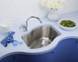 Modern wave shaped designer bathroom sink completed by a local Bella Vista plumber.
