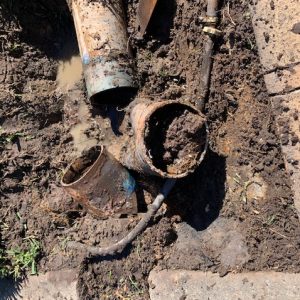 Identifying the root cause-replacing crushed pipes to ensure long-term, health drainage.