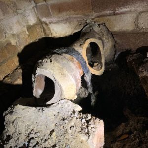 Expertly navigating tight spaces to identify and repair deep-line sewer blockages.