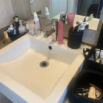 Completed basin mixer tap repair on a bathroom vanity in Castle Hill, performed by Abide Plumbing, showing high-quality new mini taps and flexi-hoses.