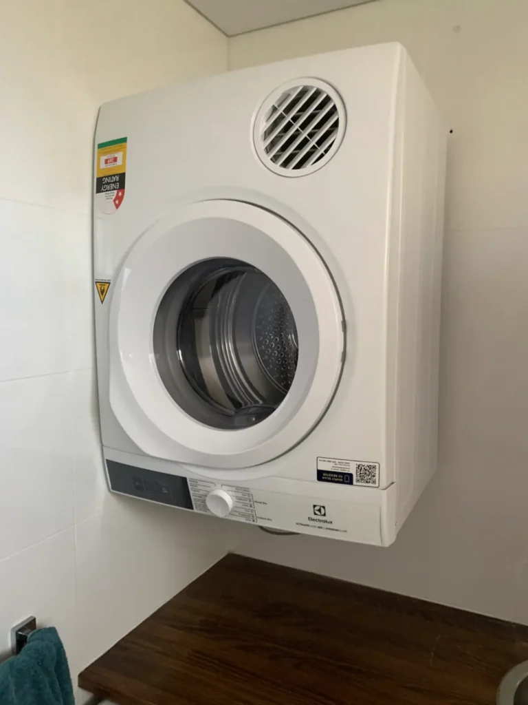 Wall mounted clothes dryer installation with support brackets Artarmon